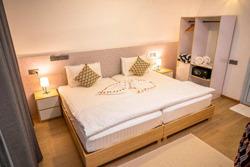 Postel nebo postele na pokoji v ubytování Holiday Crib