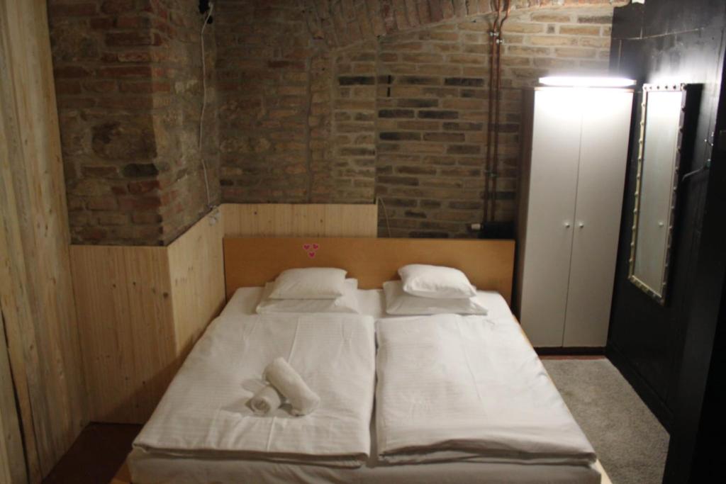 Postel nebo postele na pokoji v ubytování Alba Hostel