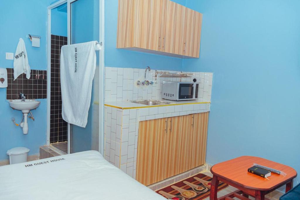 Kuchyň nebo kuchyňský kout v ubytování HM guest house