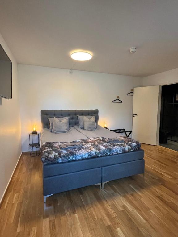 Postel nebo postele na pokoji v ubytování Brukshotellet