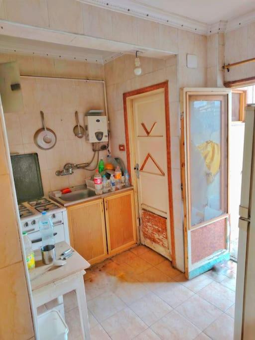 Kuchyň nebo kuchyňský kout v ubytování Downtown Cairo Gem