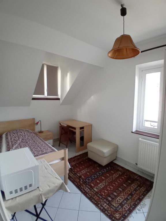 Ένα ή περισσότερα κρεβάτια σε δωμάτιο στο Chambre sur la Bièvre
