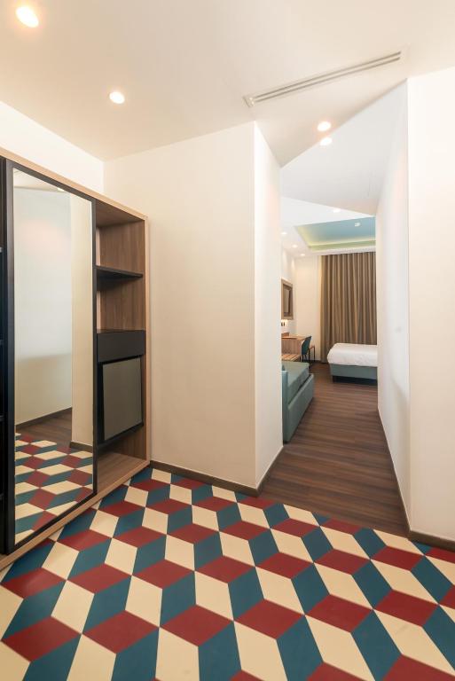 Postel nebo postele na pokoji v ubytování Hotel Vittoria