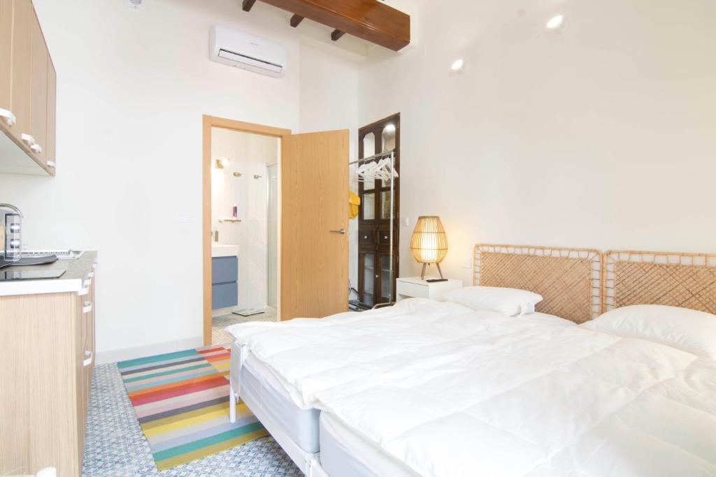 Letto o letti in una camera di CBS- Calpe biking and summer