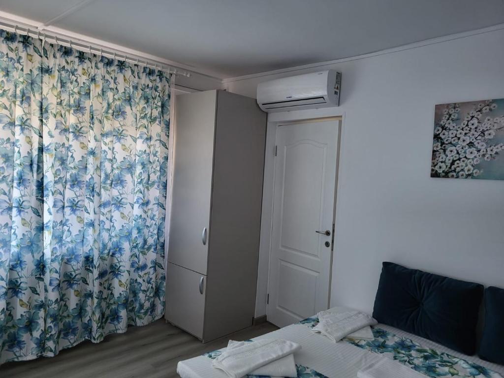 Postel nebo postele na pokoji v ubytování Casa Novis