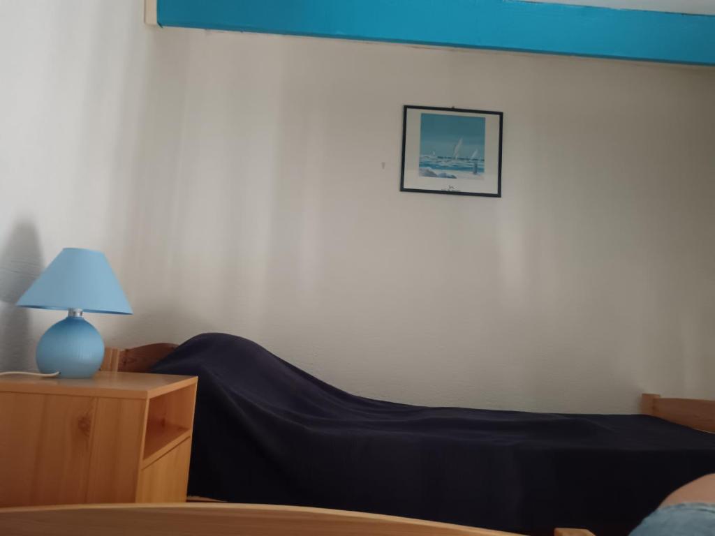 Llit o llits en una habitació de Appartement vue port - Port Leucate