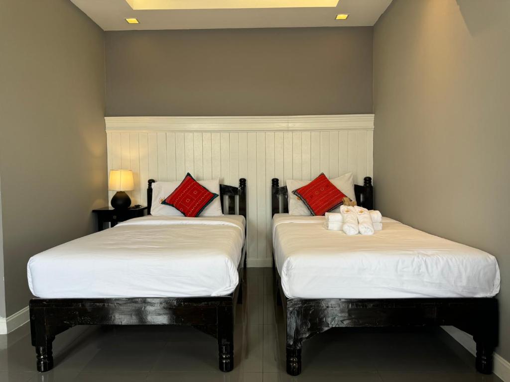 Postel nebo postele na pokoji v ubytování WUA LAI Boutique Hotel Chiang Mai