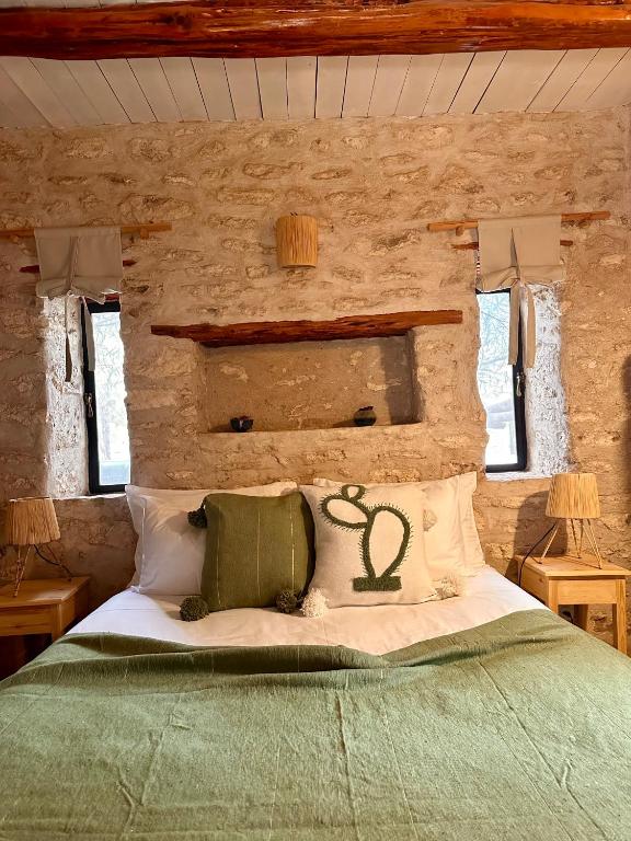 Postel nebo postele na pokoji v ubytování Atlantis 12, Maison d'hôtes et d'art