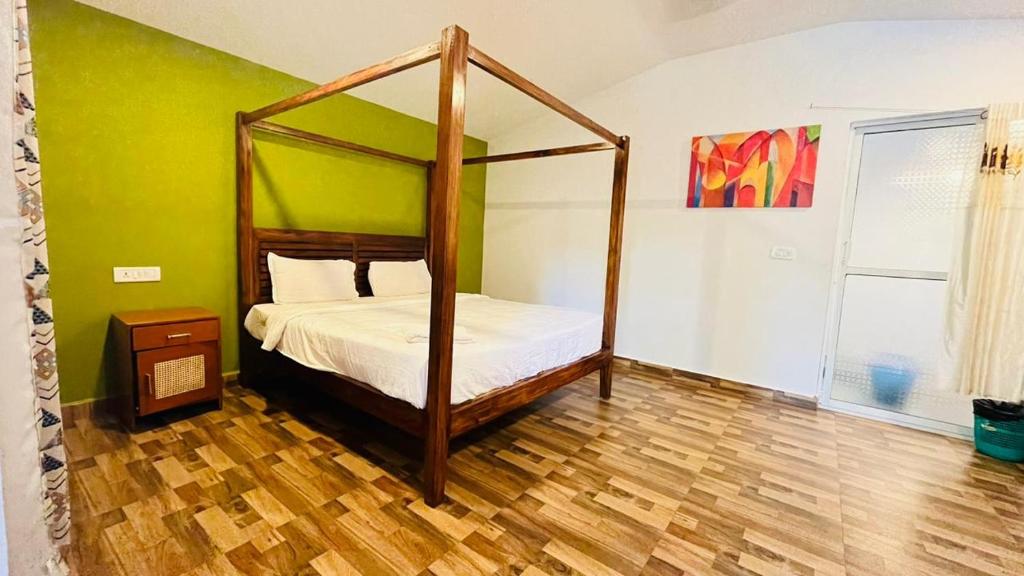 Postel nebo postele na pokoji v ubytování King Villa Goa