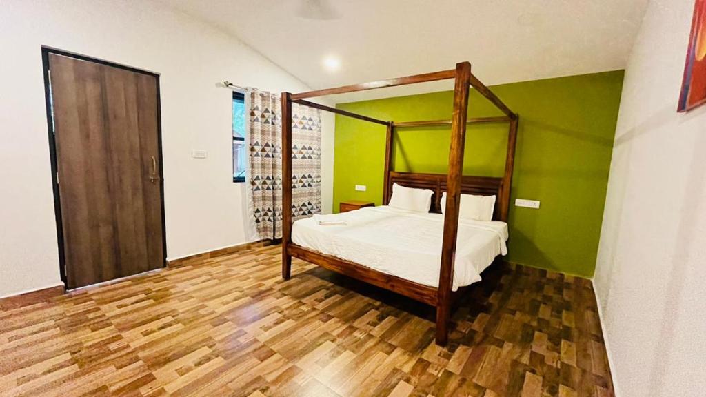 Postel nebo postele na pokoji v ubytování King Villa Goa