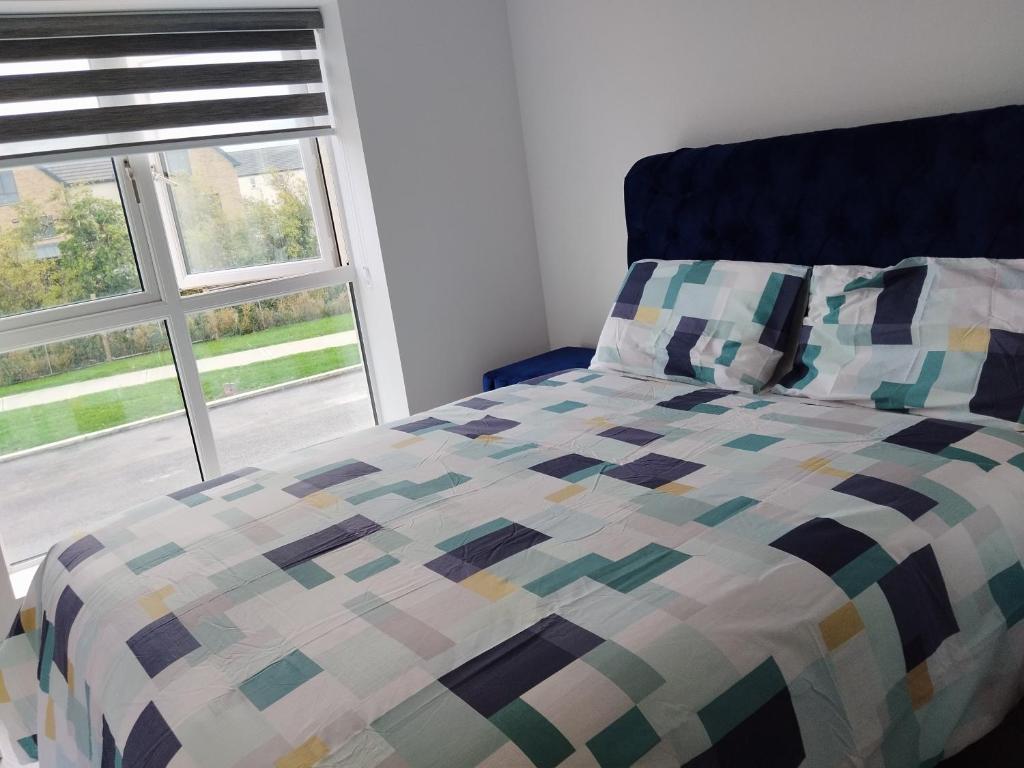 Postel nebo postele na pokoji v ubytování Homestay