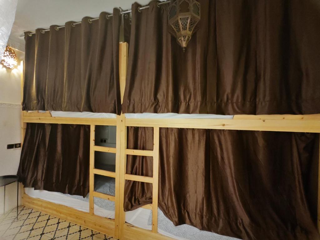 Postel nebo postele na pokoji v ubytování Dar Suncial
