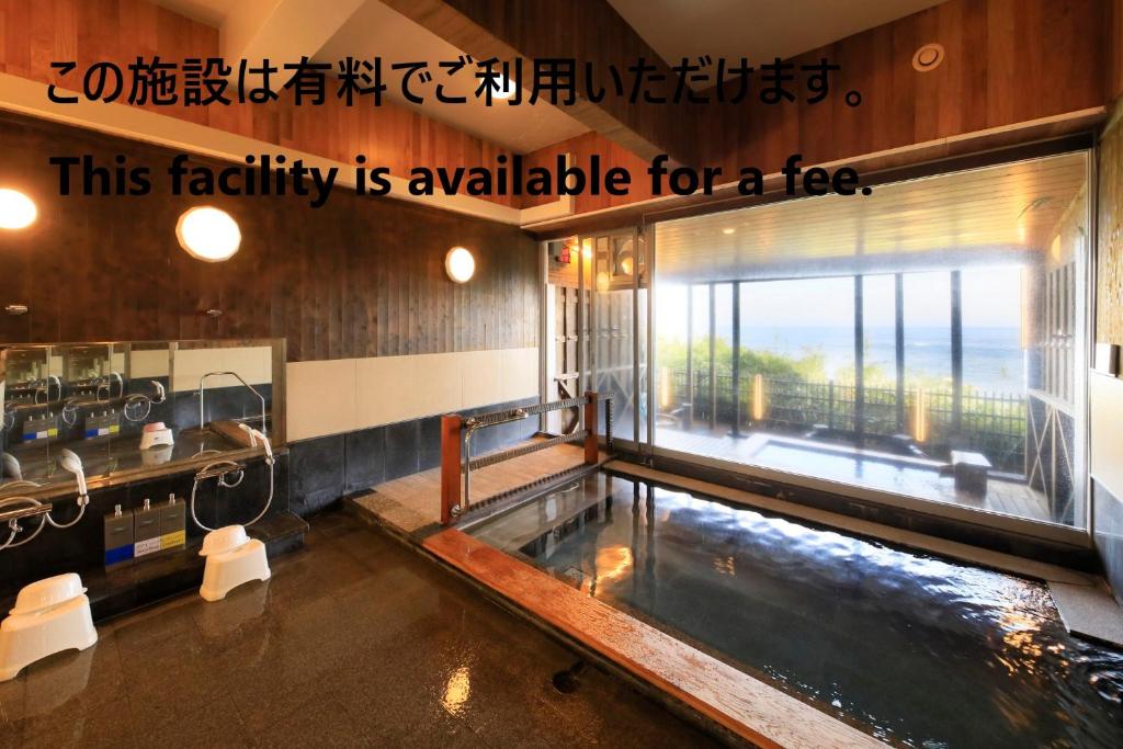 Fotografie z fotogalerie ubytování 恵比寿島まで歩く1分広くゲストハウス無料駐車場温泉利用可能の宿 v destinaci Šimoda