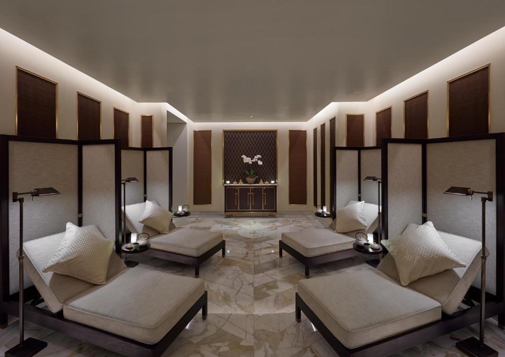 Postel nebo postele na pokoji v ubytování Mandarin Oriental, Doha