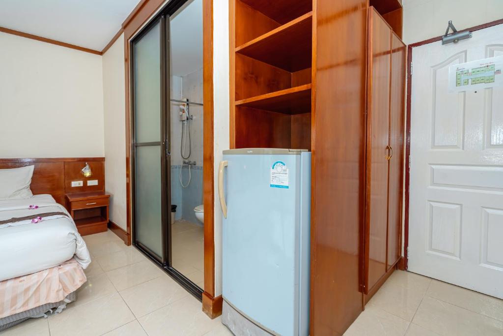 Postel nebo postele na pokoji v ubytování Outdoor Inn Kata Hotel