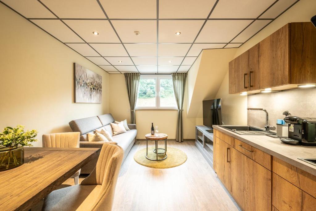 Kuchyň nebo kuchyňský kout v ubytování Apart Hotel Lang