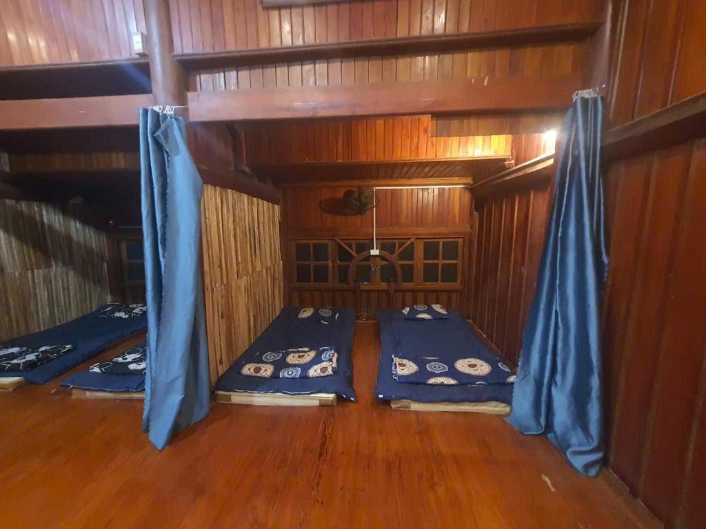 Postel nebo postele na pokoji v ubytování Time Travel - Ha Giang Loop Tour