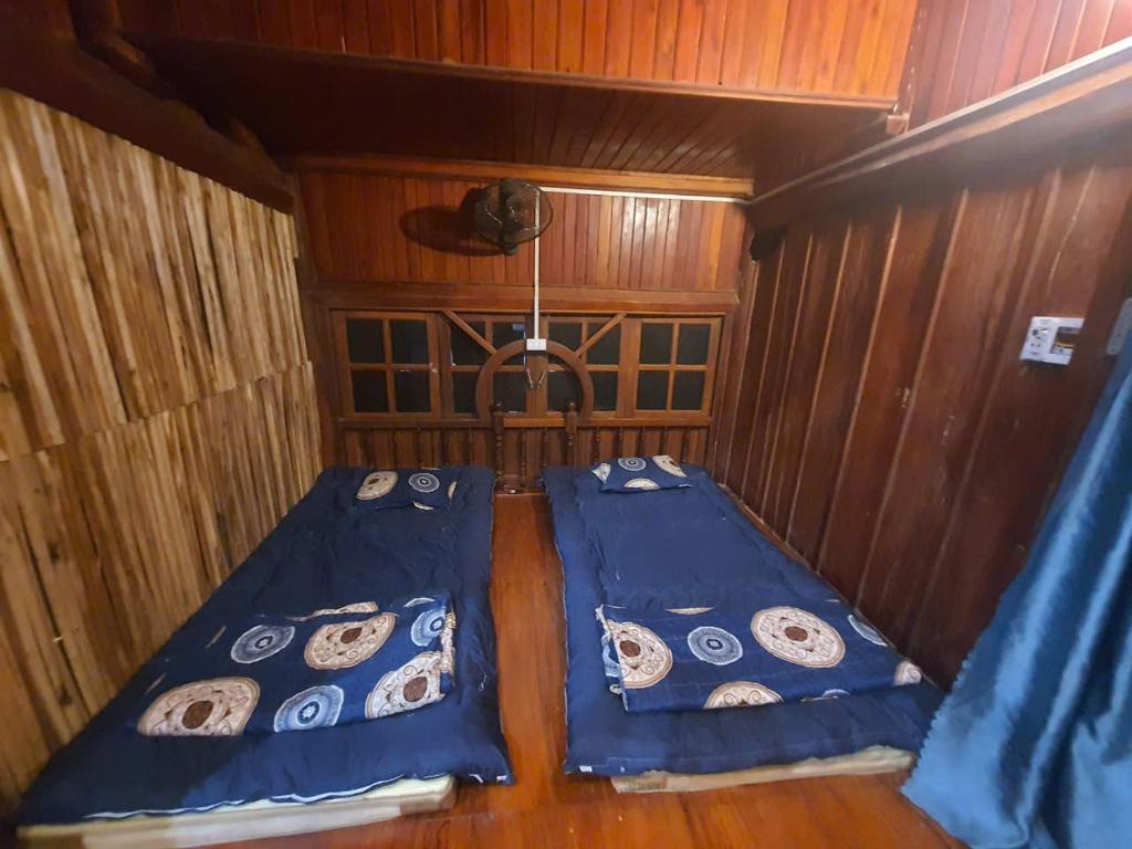 Postel nebo postele na pokoji v ubytování Time Travel - Ha Giang Loop Tour