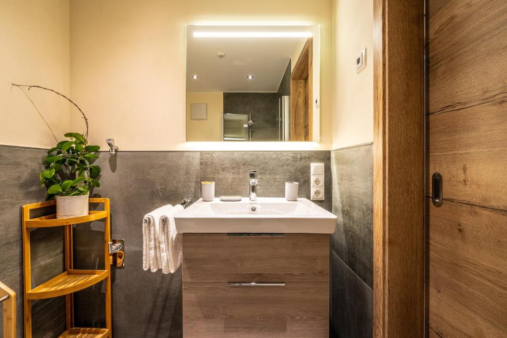 Koupelna v ubytování Apart Hotel Lang