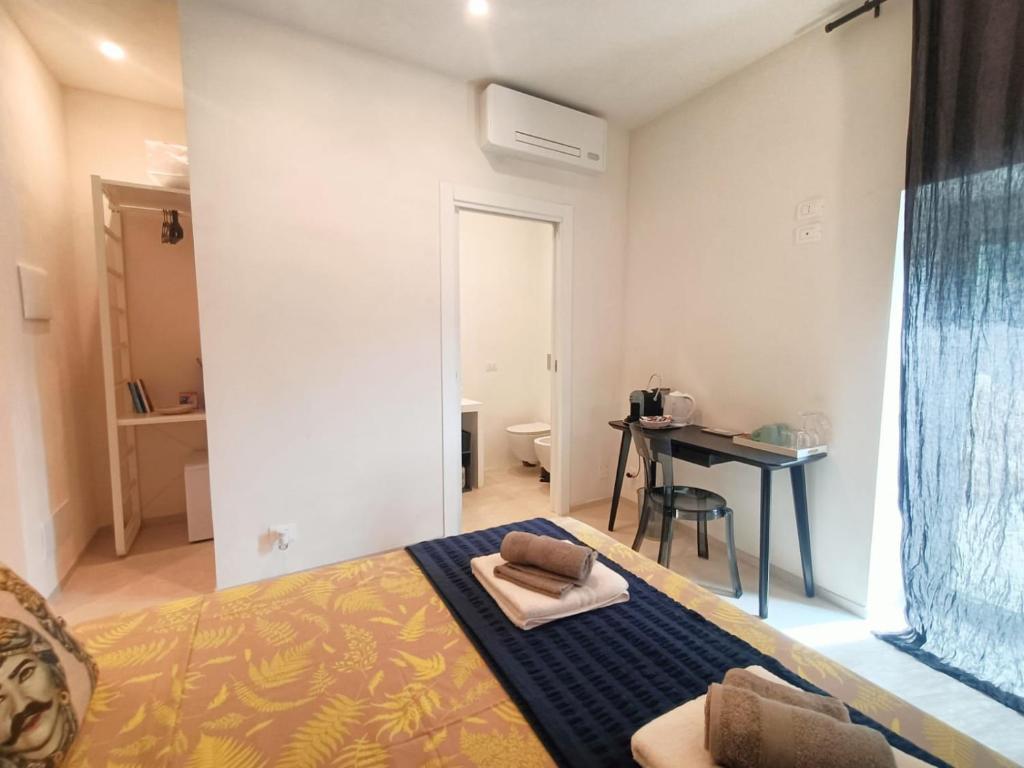 Postel nebo postele na pokoji v ubytování Acciana Rooms