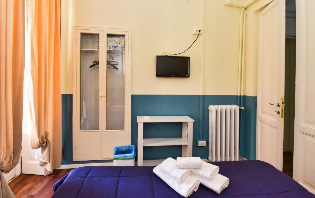 Posteľ alebo postele v izbe v ubytovaní Hotel Suisse