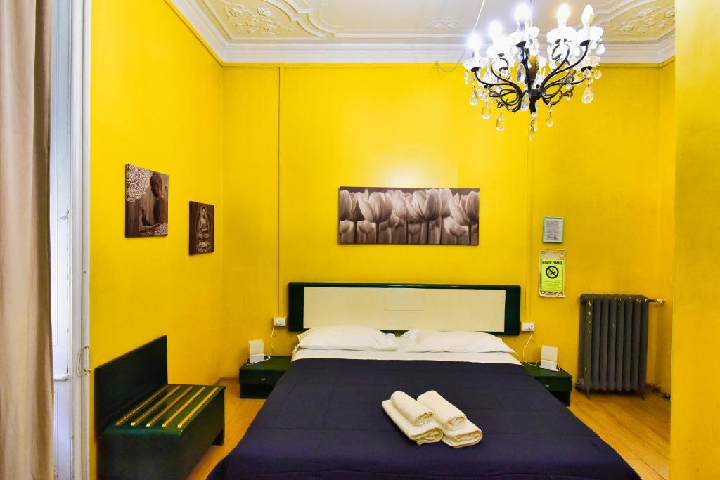 Posteľ alebo postele v izbe v ubytovaní Hotel Suisse