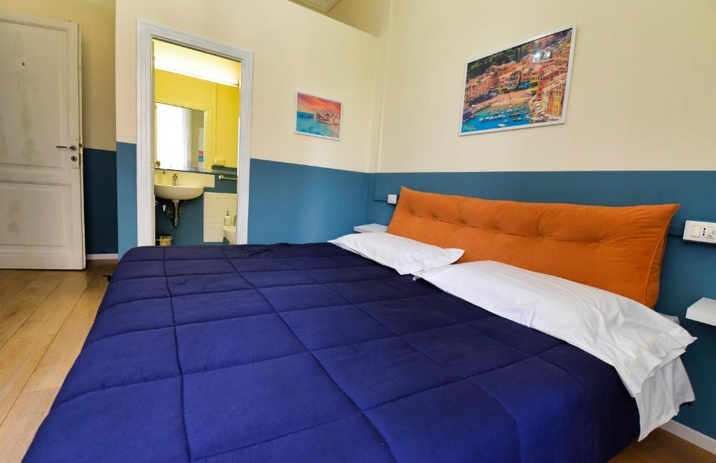Posteľ alebo postele v izbe v ubytovaní Hotel Suisse