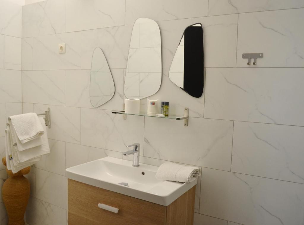 Koupelna v ubytování Hôtel du Parc