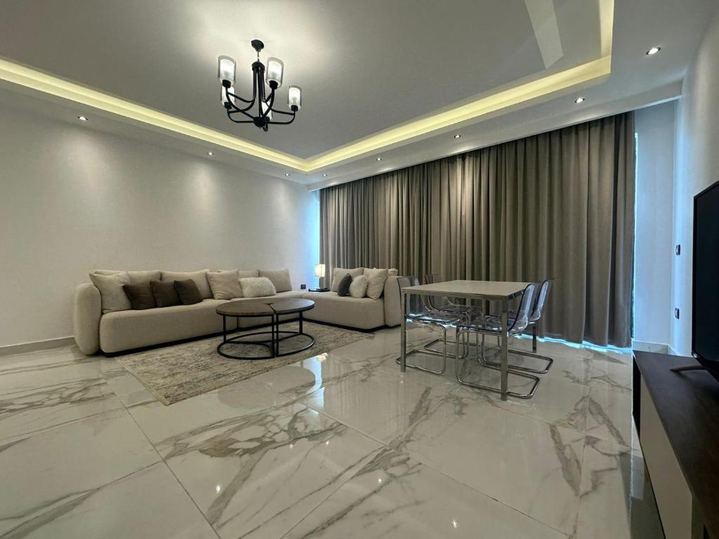 Posezení v ubytování Luxury apartment in new cairo lake view residence