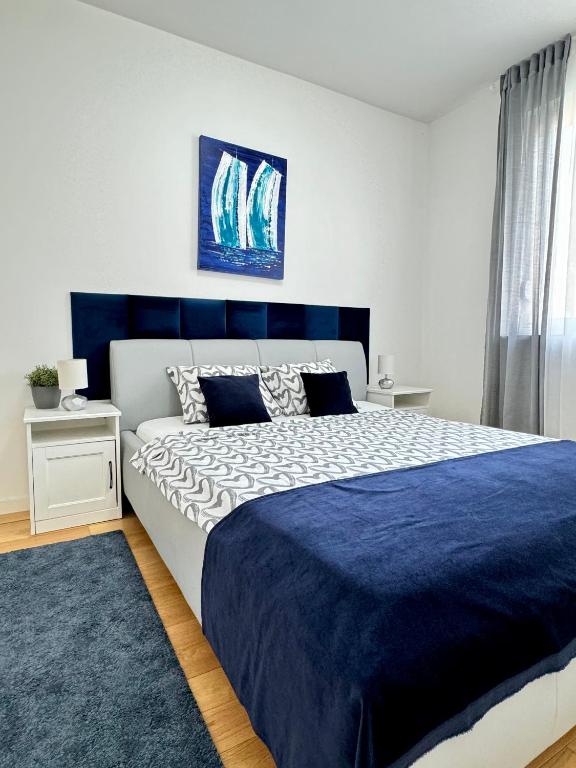Postel nebo postele na pokoji v ubytování Ocean Apartment