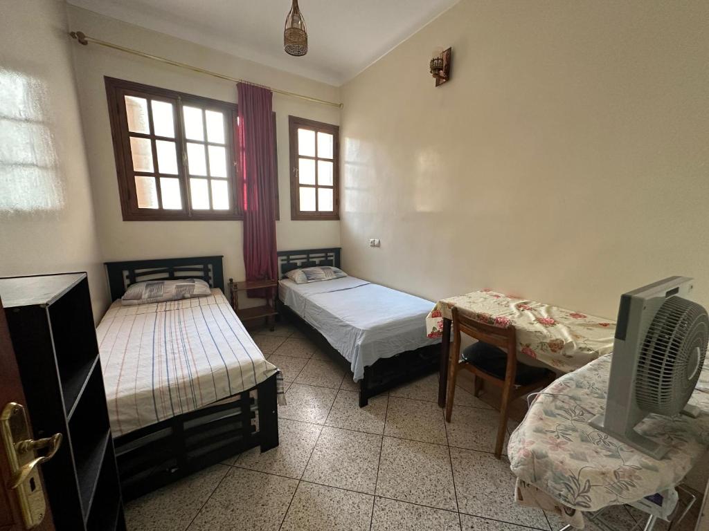 Postel nebo postele na pokoji v ubytování Chez-soi