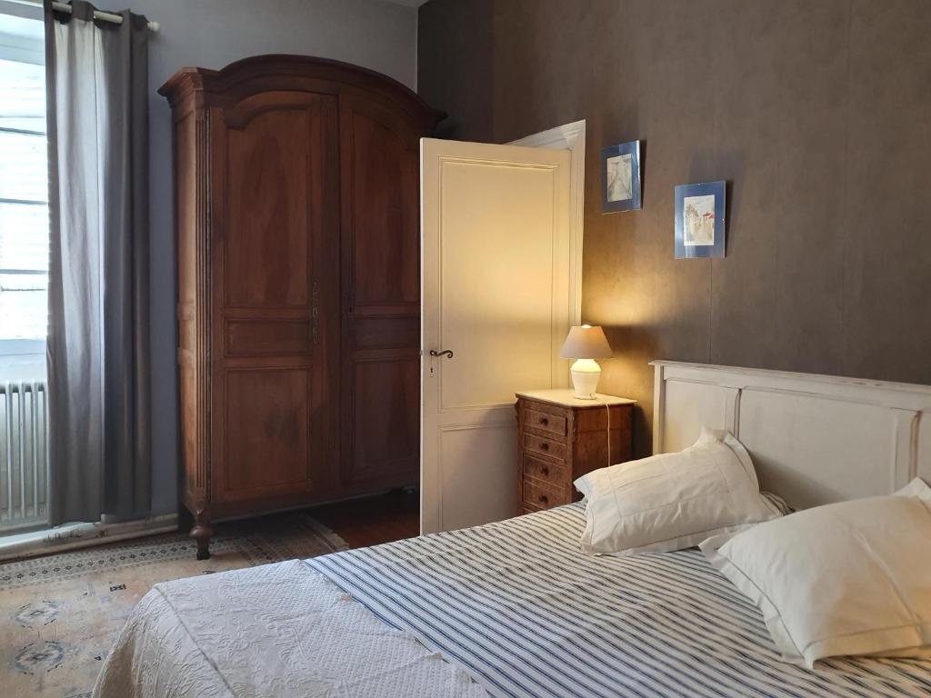 Postel nebo postele na pokoji v ubytování Chambres d'hôtes La Hourqueyre