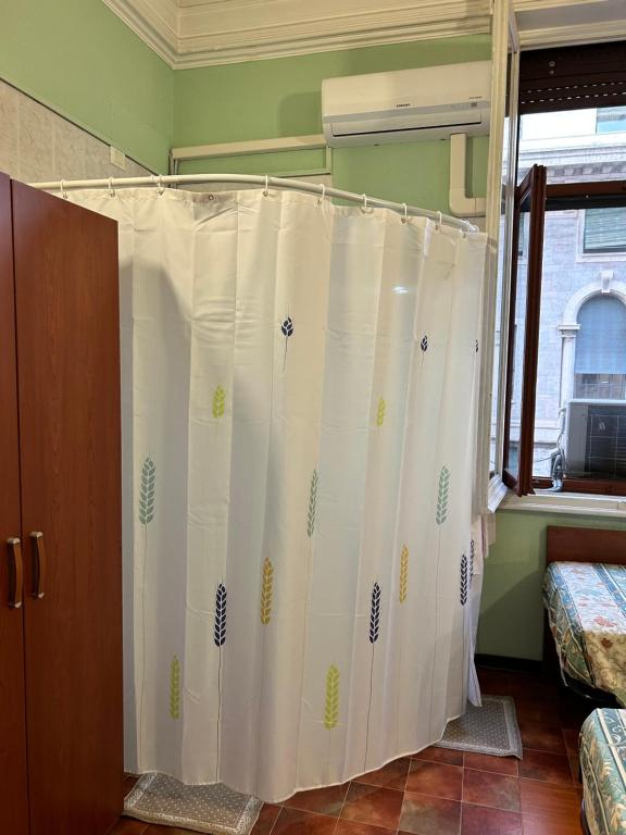 Postel nebo postele na pokoji v ubytování Hotel Barone