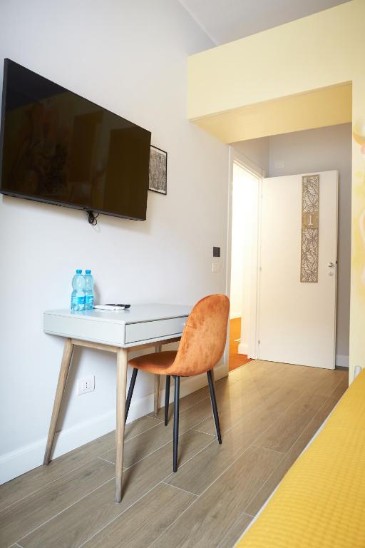 TV a/nebo společenská místnost v ubytování Hotel Reyes