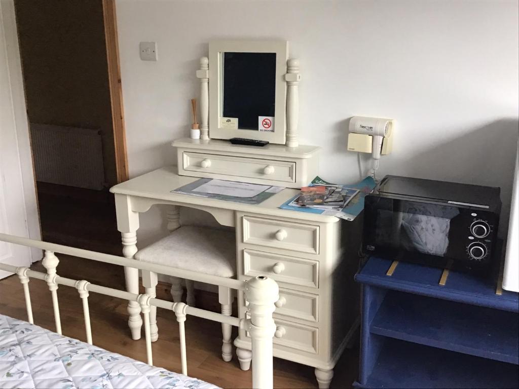 Postel nebo postele na pokoji v ubytování Blakehill House