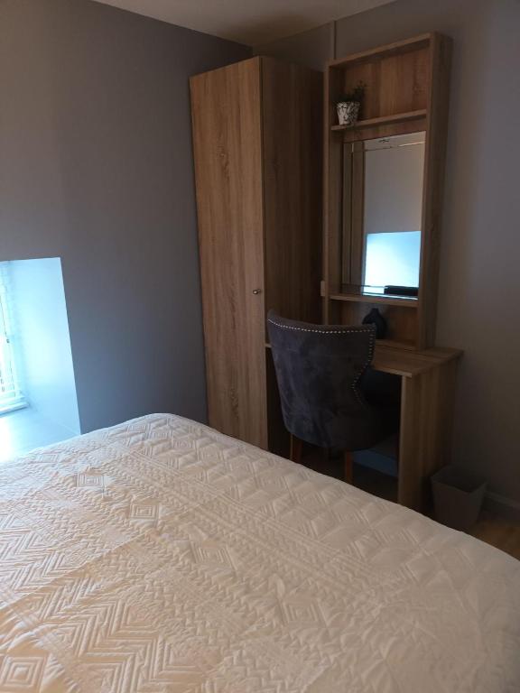 Postel nebo postele na pokoji v ubytování Apartment 2 at busy bee