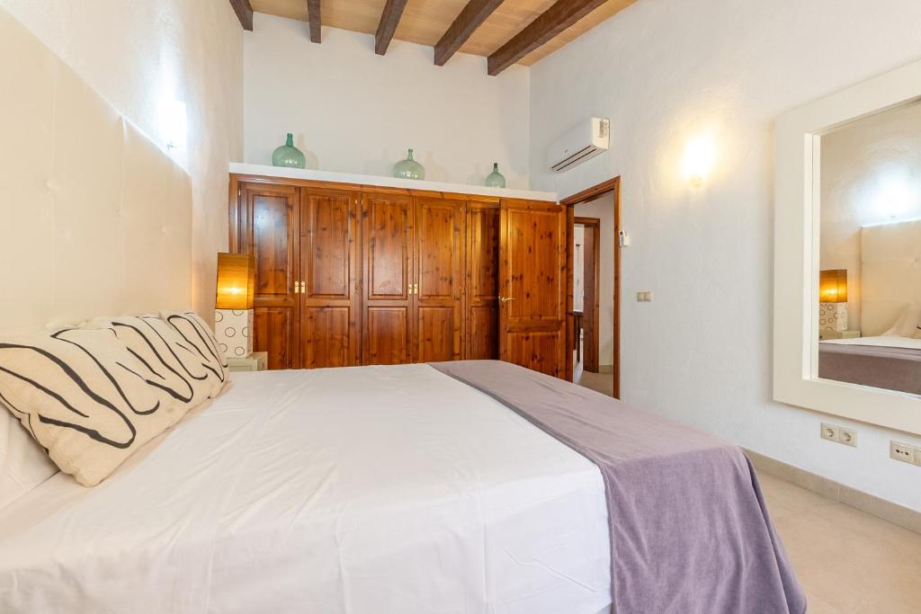 Postel nebo postele na pokoji v ubytování Villa Muro Garden