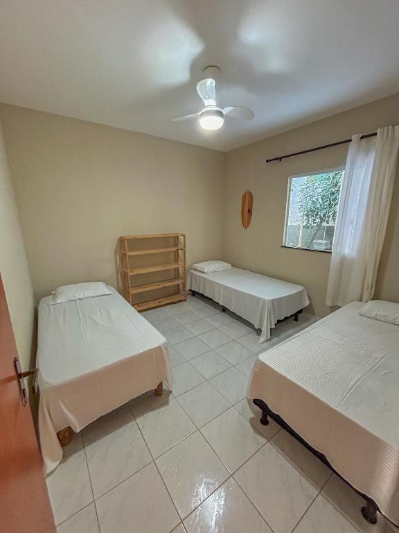 Postel nebo postele na pokoji v ubytování Surf Stop Hostel Serra Grande