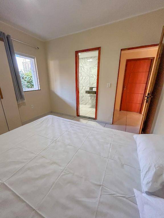 Postel nebo postele na pokoji v ubytování Surf Stop Hostel Serra Grande