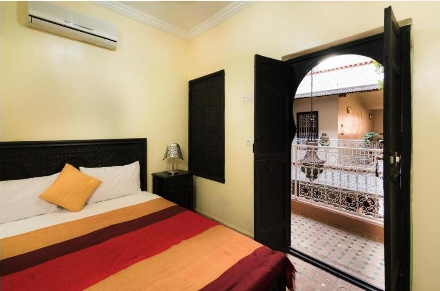 Postel nebo postele na pokoji v ubytování Riad Salma Restaurant Spa