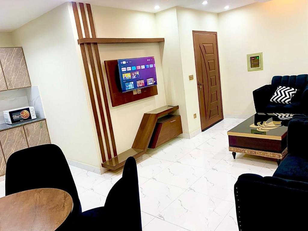 Televisor o centre d'entreteniment de Royal Height Residence