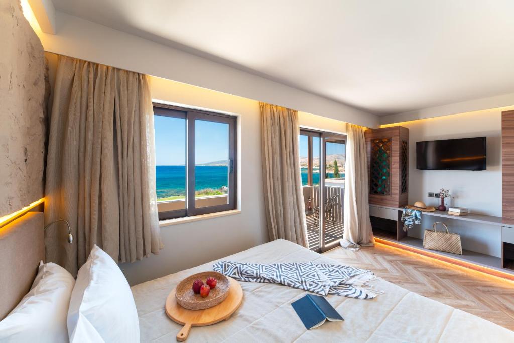A bed or beds in a room at Al Mare Villas