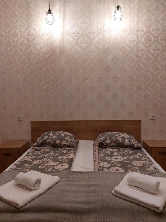 Llit o llits en una habitació de Eco Oasis