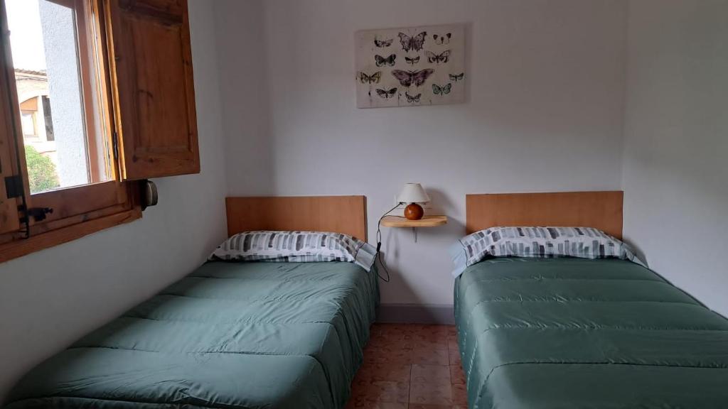 Postel nebo postele na pokoji v ubytování Dinosaur House