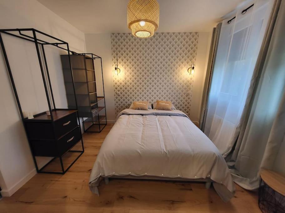 Postel nebo postele na pokoji v ubytování Appartement T2 Frangy