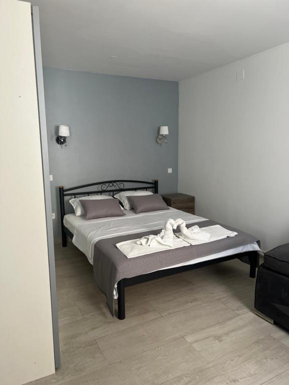 Postel nebo postele na pokoji v ubytování Villa Drinka Apartments