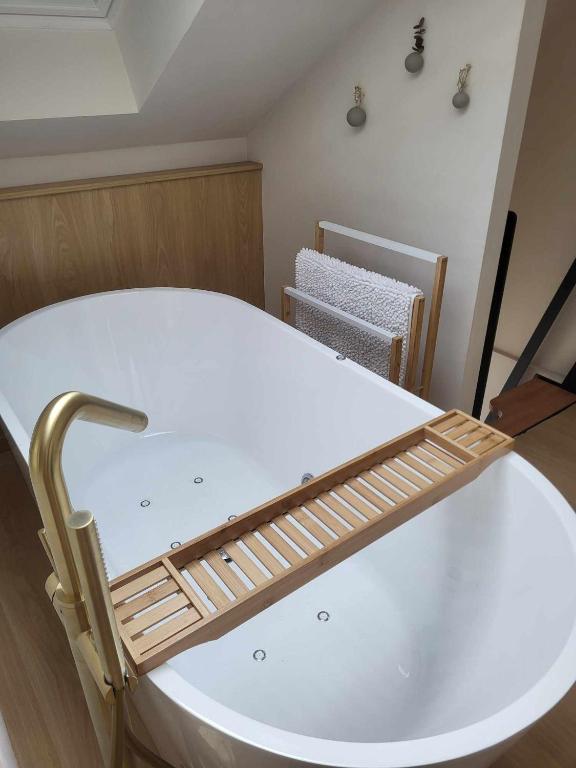 Postel nebo postele na pokoji v ubytování Une Cabane au Verger