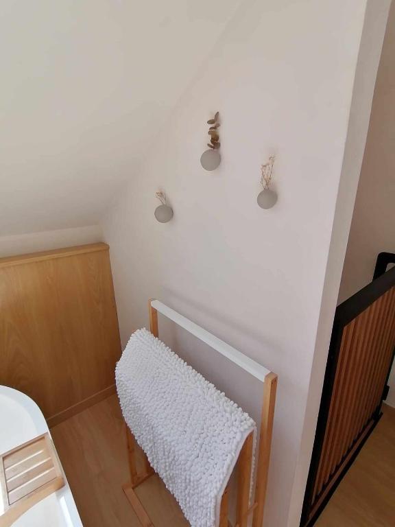 Postel nebo postele na pokoji v ubytování Une Cabane au Verger