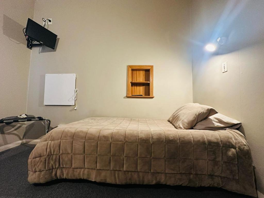 Postel nebo postele na pokoji v ubytování Merrylees Hotel