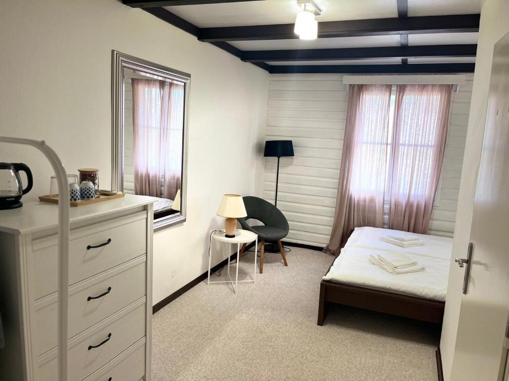 Postel nebo postele na pokoji v ubytování B&B Vltavín